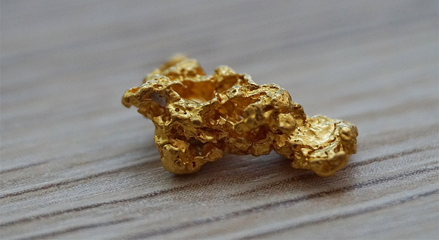 El oro baja y BofA advierte sobre posibles activaciones de stop‑loss