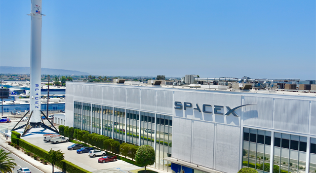 SpaceX factory with rocket launching