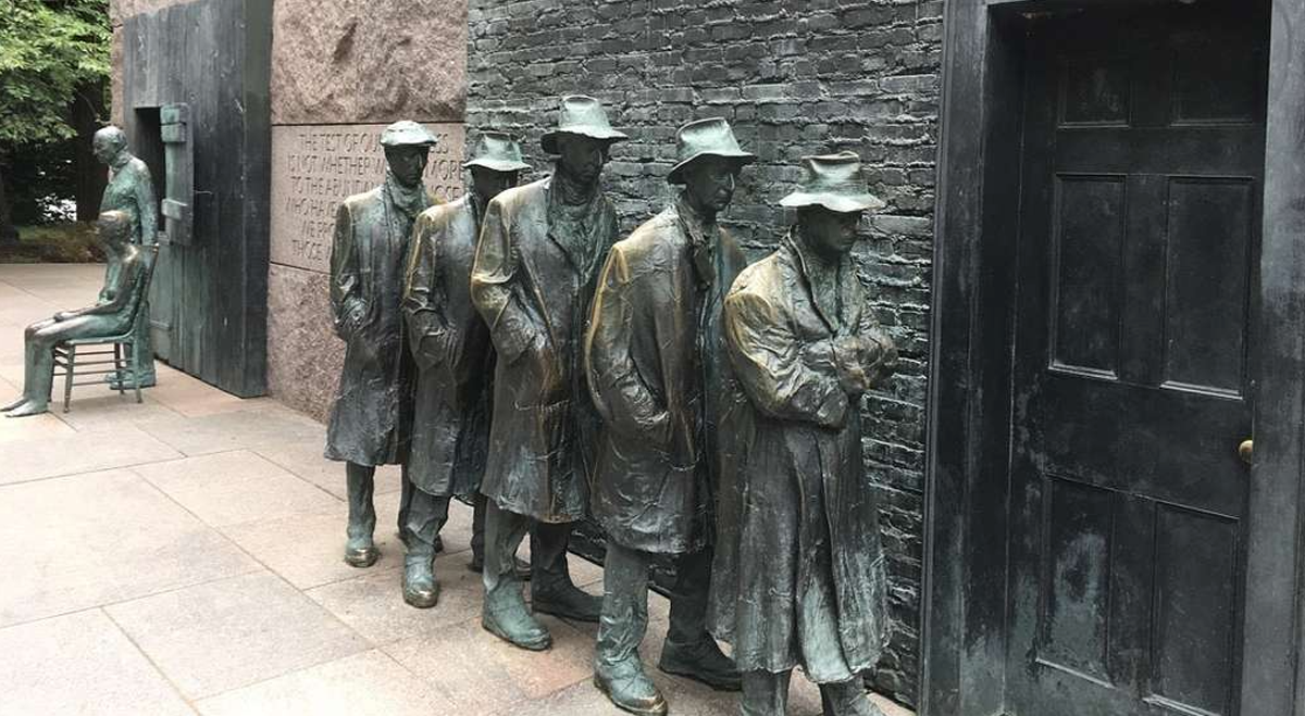Statues of men in unemployment line