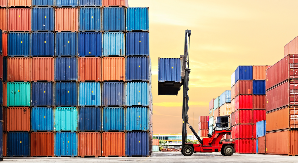 Cargo containers with forklift truck