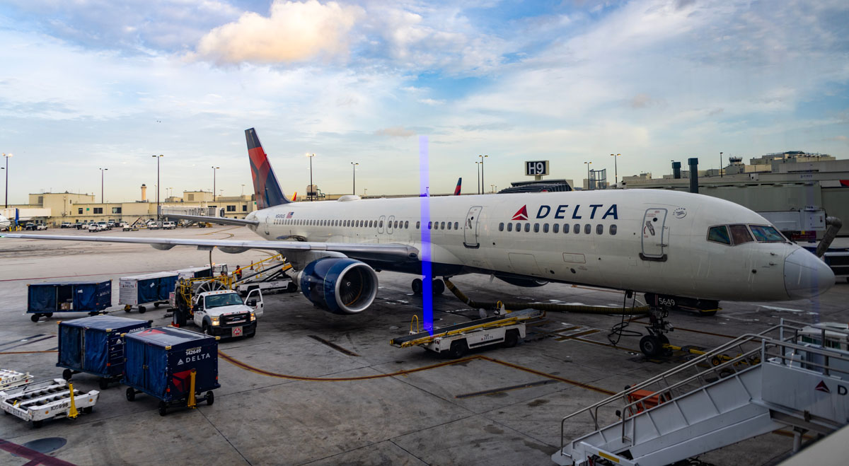 Delta Airlines plane at airport terminal
